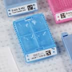 Cassetta per campioni di tessuto identificata con un’etichetta bianca. 